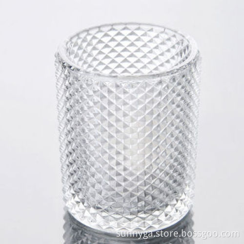 New and good quality glass candle holders, with embossed patterns, spray colors are available